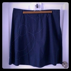 Navy blue embroidered flower skirt.